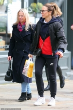 Mel C enjoys a relaxing shopping trip with mum Joan O'Neill in London...