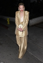 Jaime King nails androgynous chic in metallic gold blazer and matching flowy trousers