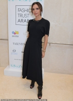 Victoria Beckham keeps it simple in demure black dress as she makes