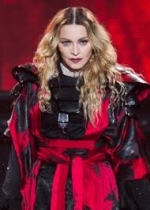 Madonna releases grim, religious-themed music video for her fifth single Dark Ballet