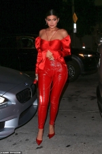 Kylie Jenner sizzles in fire engine red crop top and skin-tight vinyl trousers