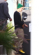 Justin Bieber smiles as he's seen heading into a Hollywood