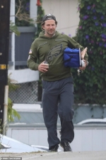 Bradley Cooper represents his hometown of Philadelphia while heading to a beach party in Malibu