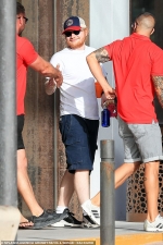 Ed Sheeran makes a rare public appearance with ab-flashing wife