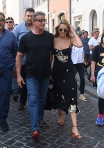 Sylvester Stallone's daughter Sophia, 23, looks glamorous in a floral midi