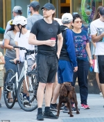 Tom Hiddleston enjoys a stroll through Central Park with his spaniel