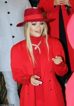 Rita Ora looks ravishing in red as she steps out in bold outfit to promote