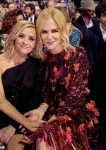 Big Little Lies' Reese Witherspoon enjoys a reunion with co-star Nicole Kidman at the CMA Awards...