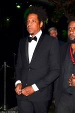 Jay-Z looks dapper in classic black tuxedo as he attends Grammys afterparty without his wife Beyonce