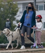 Olivia Wilde dons face mask to walk dog in LA with daughter Daisy, 3