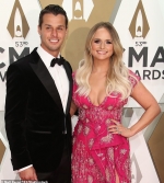 Miranda Lambert and Brendan McLaughlin beam happily as they enjoy treats from ice cream truck