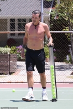 Gavin Rossdale, 54, flaunts chiseled chest at tennis lesson...
