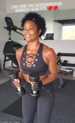 Gabrielle Union shows off her taut midriff in laced-up black Good American