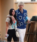 Megan Fox cozies up to beau Machine Gun Kelly as the pair hit up the Mayan Theater