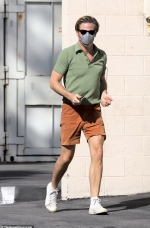 Chris Pine keeps it casual in polo short and shorts as he heads to the studio