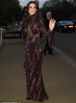 Demi Moore, 53, is sheer delight in cleavage-flashing panelled gothic gown