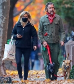 Ethan Hawke, 50, looks effortlessly cool in a green military-style jacket as he and his wife