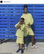 Kelly Rowland shows off growing baby bump as she twins with son Titan