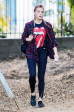 Amber Heard shows off fall fashion in red flannel and a Rolling Stones