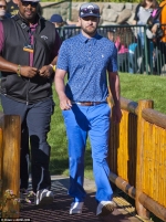 Justin Timberlake gets smack on the cheek by overzealous fan at celebrity golf