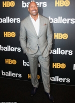 Dwayne Johnson tops list of world's highest-paid actors after taking home $64m last year...