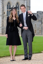 Eddie Redmayne beams with pride beside wife Hannah as he's made an OBE