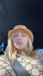 Billie Eilish proudly models a Gucci bucket hat and oversized polo shirt on Instagram as she continues