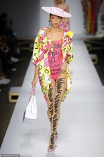 Stella Maxwell storms the runway in 80s-inspired graphic-print ensembles