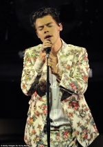 Quirky Harry Styles rocks his statement style in a vintage inspired