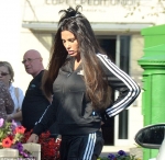 Katie Price shows off total image overhaul as she dyes her blonde tresses dark brown