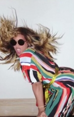 Beyonce rocks a patterned mini dress as she twerks