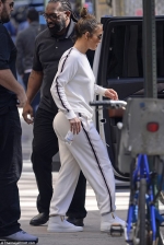 She left her couture at home! Jennifer Lopez goes bra-free in track suit for NYC meeting...