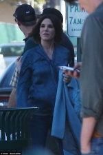 Sandra Bullock rocks frumpy outfit as co-star Sarah Paulson kicks up