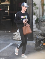 Charlize Theron leaves Korean spa looking refreshed after