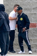 Jamie Foxx carries THREE cell phones as he meets up with Robin Thicke
