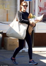 Jennifer Garner buys a bouquet of flowers in Brentwood...