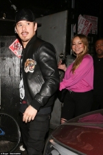 Mariah Carey models hot pink off-the-shoulder top for romantic