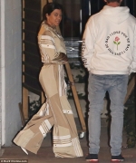 Kourtney Kardashian looks retro chic in bell-bottom Adidas