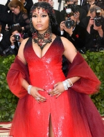 Nicki Minaj dons devilish red dress for Catholic-themed Met Gala