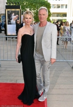 Sting and wife Trudie Styler cuddle up on the red carpet at the American