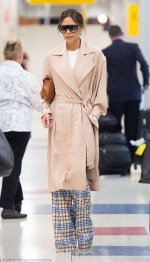 Victoria Beckham arrives solo at JFK Airport in NYC after celebrating