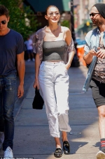 Gigi Hadid leaves little to the imagination as she goes braless