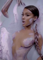 Ariana Grande writhes naked in paint in sensual video for God Is A Woman...