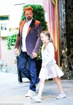 Ben Affleck spiffs up in sports coat while stepping out with daughter