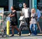 Angelina Jolie beams as she takes big brood to LA grocery store...