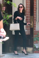 Angelina Jolie swaps white look for all-black as she steps