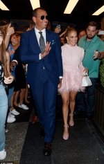 Jennifer Lopez dazzles in feathered baby pink mini dress