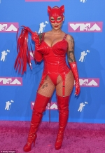 Amber Rose flaunts her hourglass figure in a devil costume for MTV