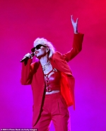 Rita Ora rocks red hot suit and crop top as she performs new song