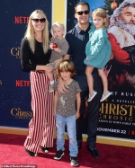 Molly Sims is a star in striped pants as she hits The Christmas Chronicles
